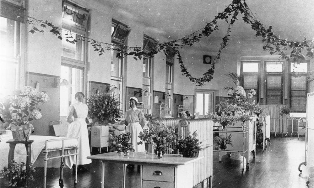 A ward decorated for Christmas circa 1920