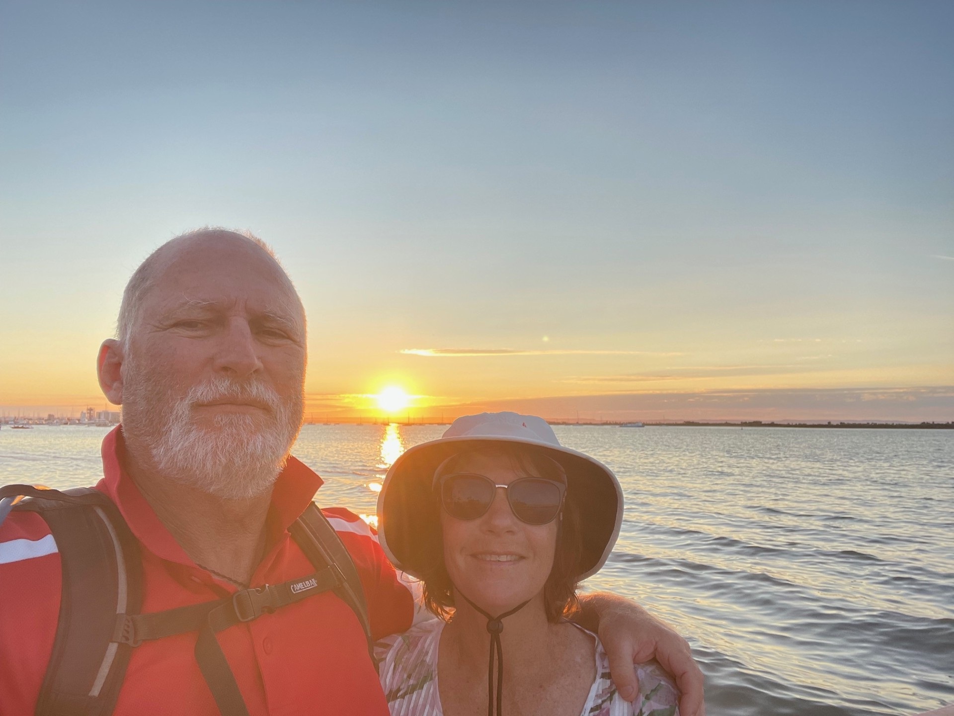 Man_and_woman_in_front_of_sunset.jpg