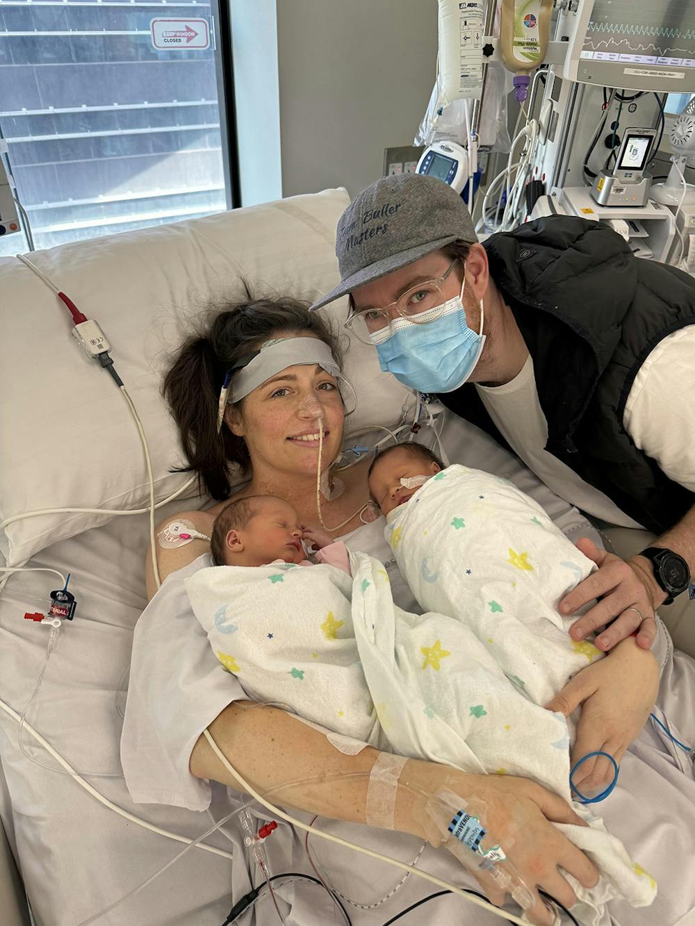 Alex on ECMO with husband and twins in hospital