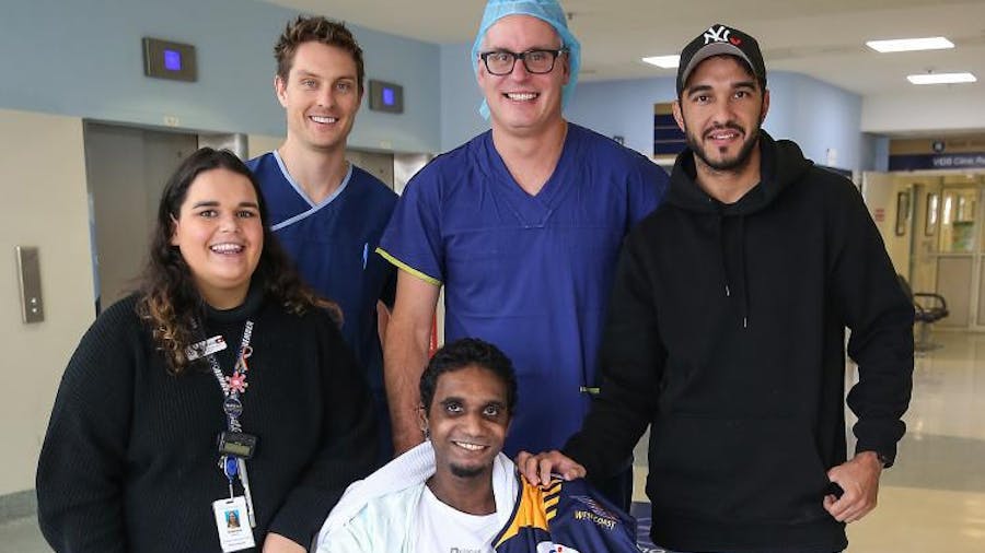 Gavin Butt with medical team and West Coast AFL player Jamie Bennell