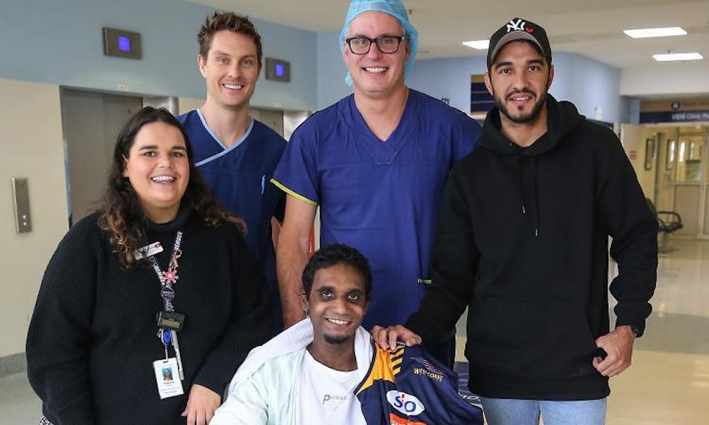 Gavin Butt with medical team and West Coast AFL player Jamie Bennell