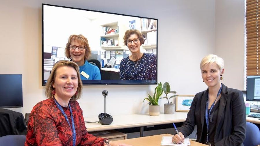 BRIGHT-YOD neuropsychiatry staff in meeting room video conference