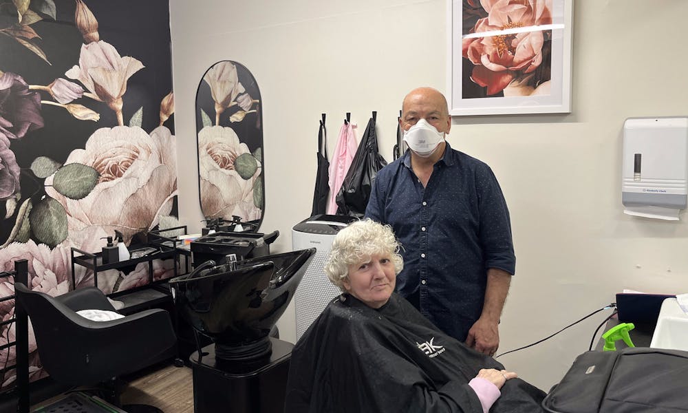 Tony and client in Boyne Russell hair salon