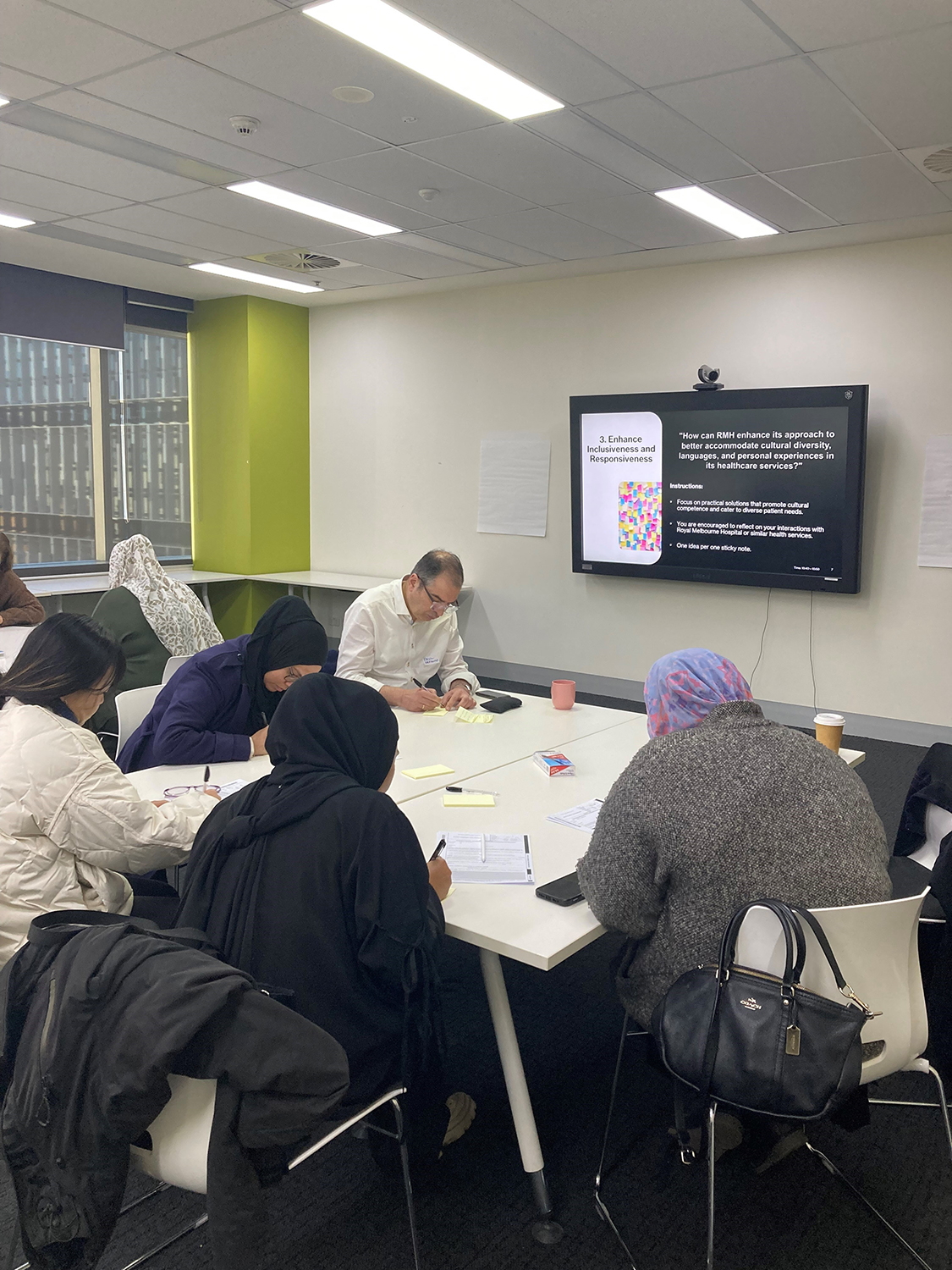 Community Engagement Strategy workshop participants writing reflections