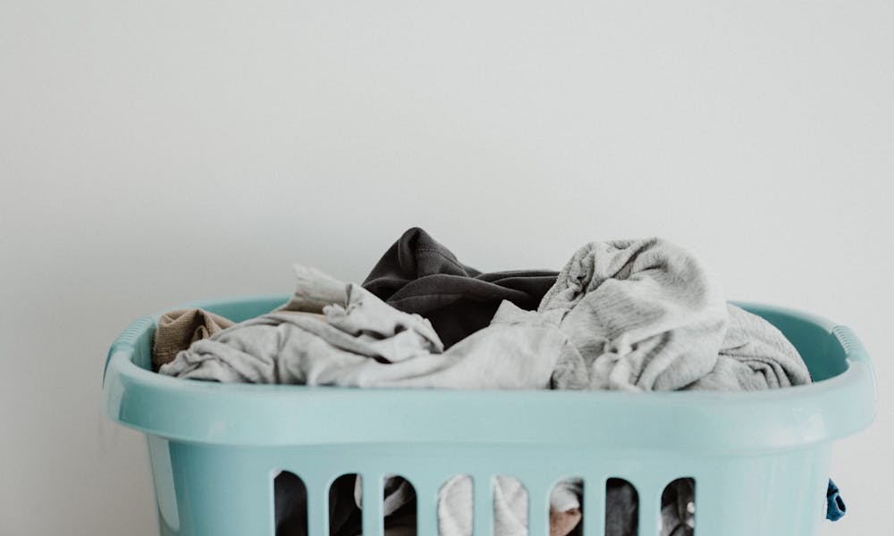Dirty clothes in washing basket