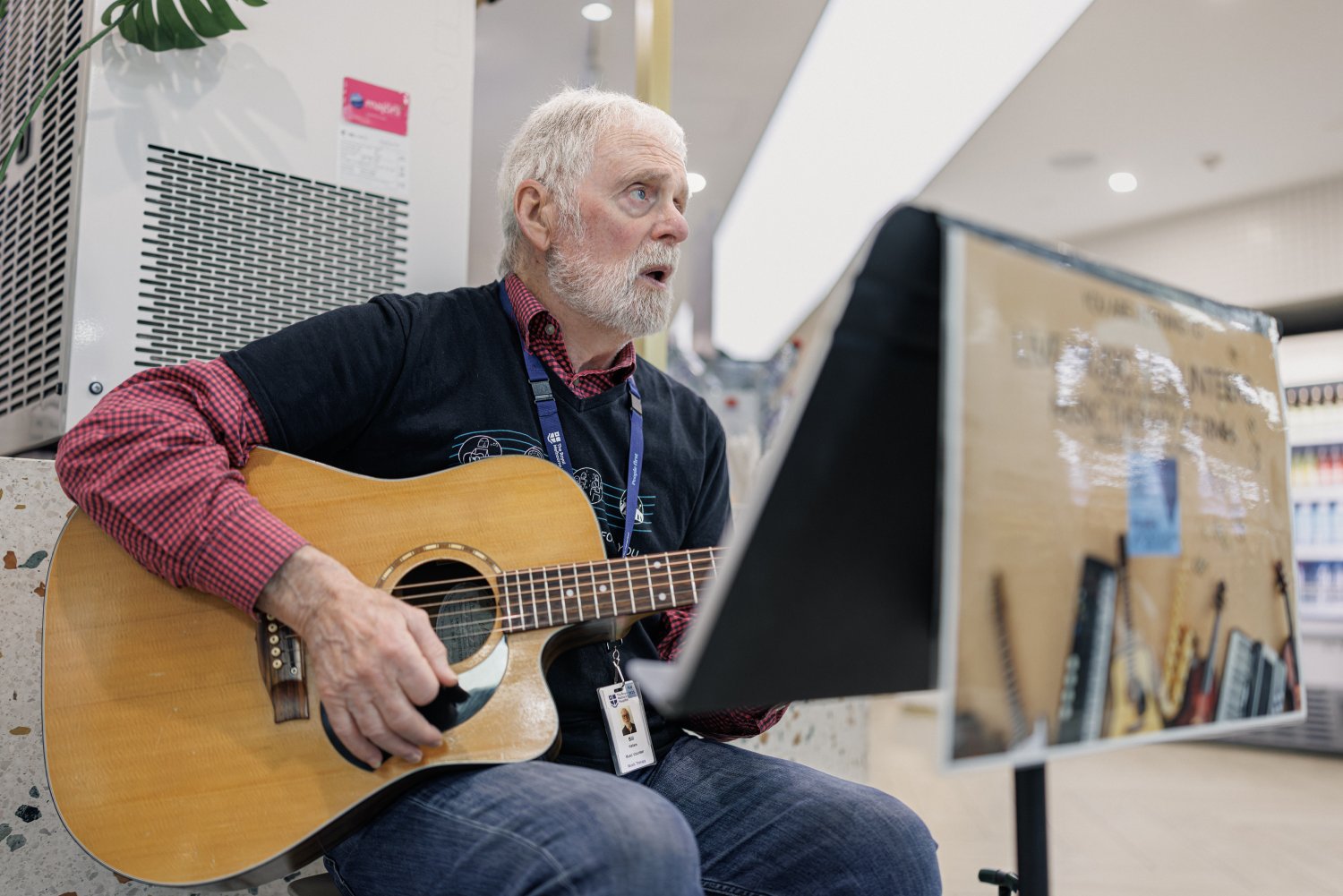 live-music-volunteer-playing-guitar-and-singing.jpg