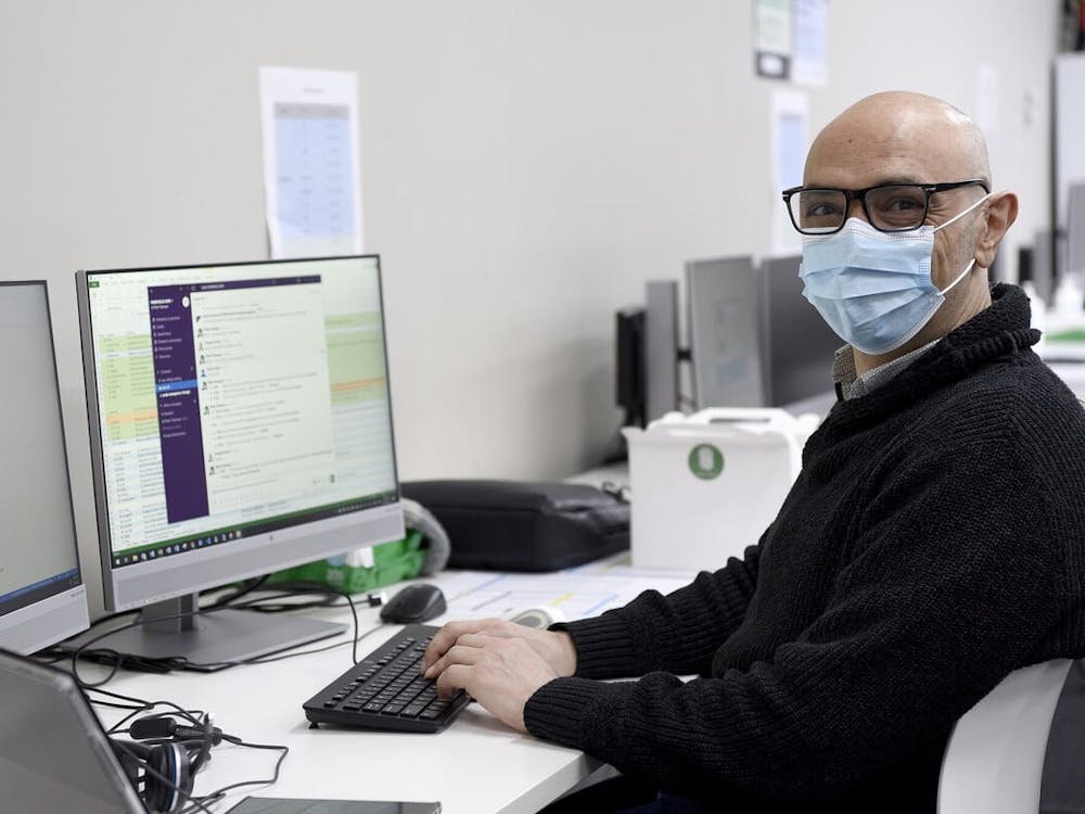 Staff member working on computer