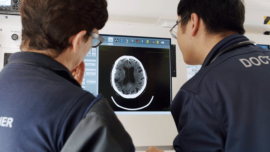 Neurology and Stroke medical staff viewing image of brain