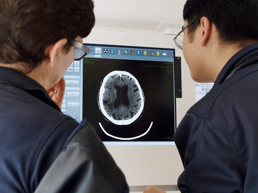 Neurology and Stroke medical staff viewing image of brain